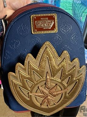 Loungefly Navy and Gold Guardians Mini Backpack